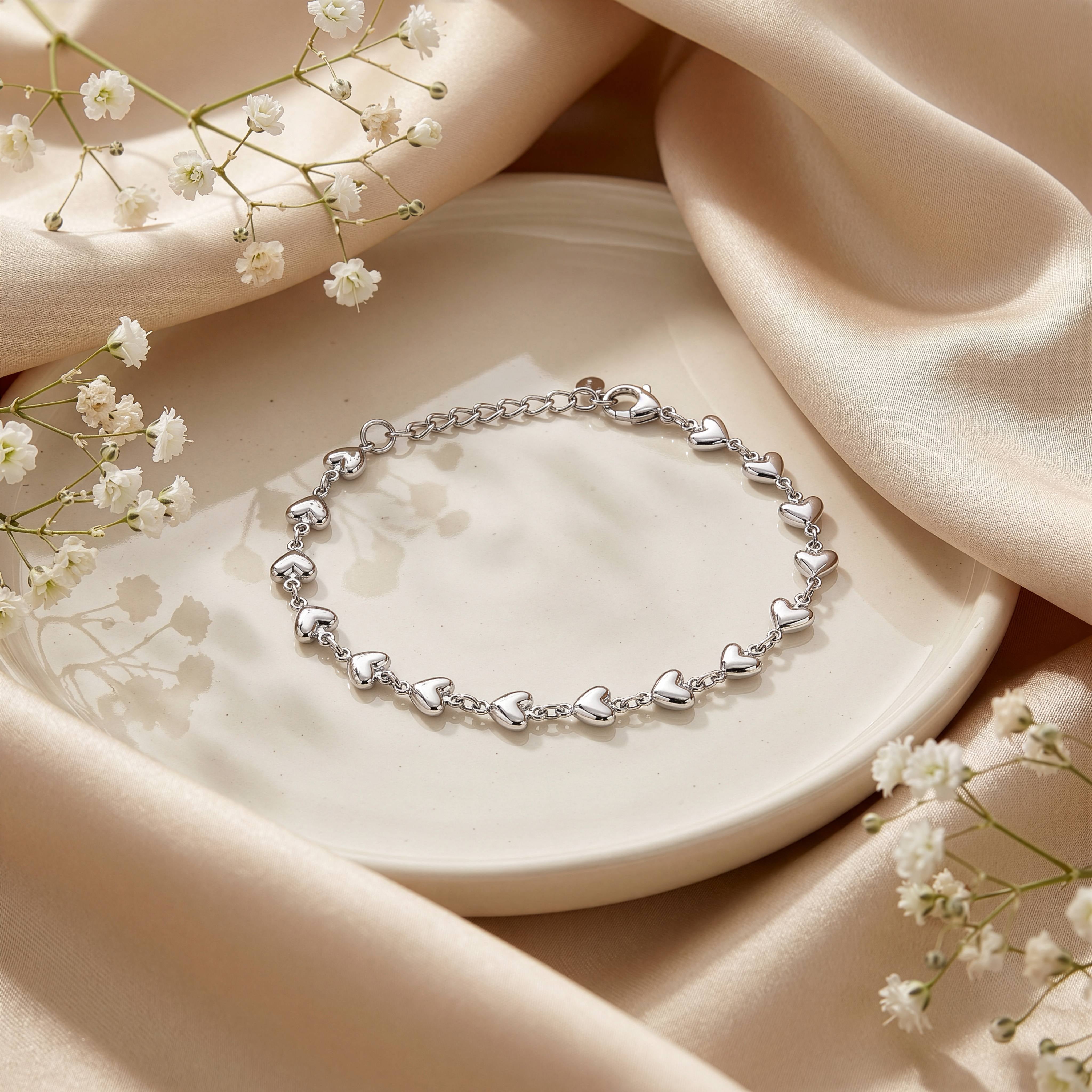 Premium Rhodium Plated Hearts Bracelet